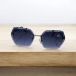 عینک افتابی زنانه فریم نامرئی شش ضلعی با عدسی دودی طیف دار از عینکه